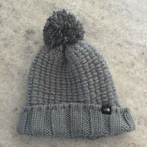 Women’s North Face hat with Pom Pom